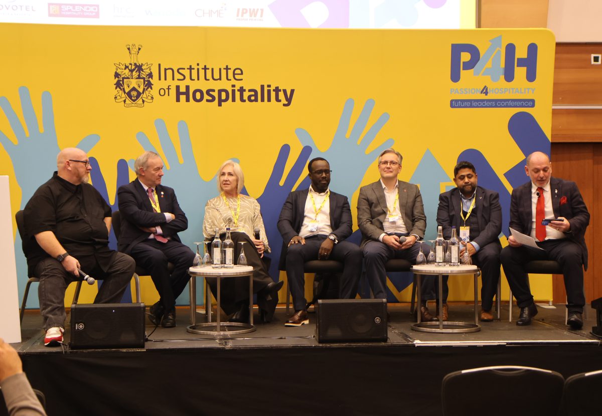 Alper Zan speaking at Passion 4 Hospitality 2025